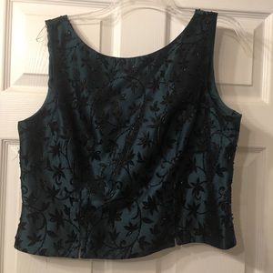 Green cocktail top with detailed black flowers